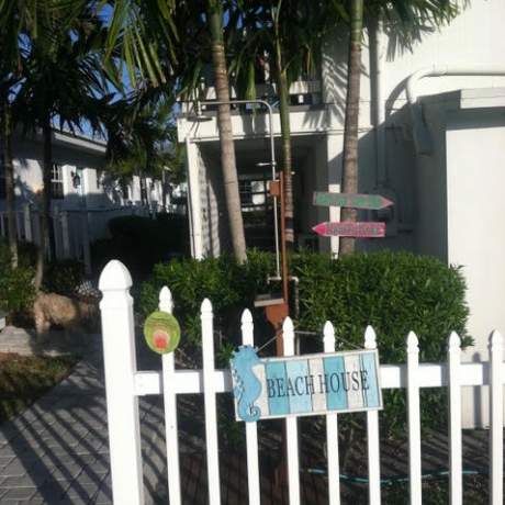 Walkway with picket fence and Beach House sign